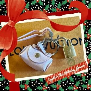 Louis Vuitton vintage lock and key set makes a beautiful gift comes with charm